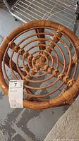 Top view of bamboo plant stand showing circular woven top design and natural bamboo joints