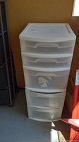 Front view of one Sterilite plastic storage drawer unit with 3 drawers, white plastic with transparent drawer fronts