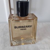 Front view of Burberry Hero bottle showing brand name and liquid inside