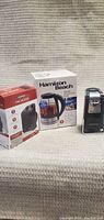 Open box lot including Konwin fan heater, Hamilton Beach electric kettle heater in box, and a black electric can opener
