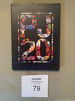 Front of the Pearl Jam Twenty DVD slipcover showing colorful collage design with text 'PJ 20'.