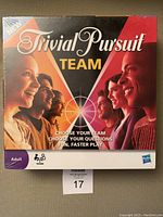 Front view of Trivial Pursuit Team board game box showing team-based play artwork and branding.