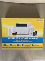 Front view of the SecurityMan Wireless Home Alarm Kit box showing the kit components and branding.