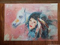 Poster with a white horse and a woman with feathers in her hair on a pink background