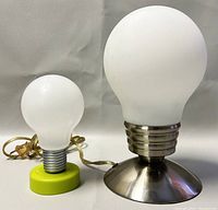 Both desk lamp and nightlight viewed from front on white background