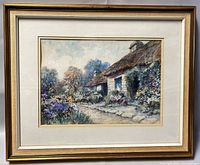 Framed watercolour painting show casing overall artwork and frame condition
