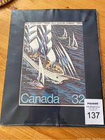 Packaged unopened Canadian 1984 stamp collection with a cover stamp depicting tall sailing ships in blue and white tones on a dark sea background.