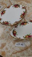 Two assorted Old Country Roses bone china plates, small serving plate and small cake plate with floral rose pattern and gold trim.