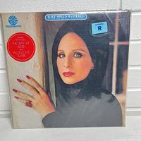 Front cover of the sealed Barbra Streisand vinyl album The Way We Were showing the artist's portrait and record details