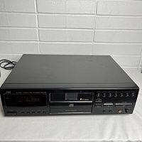 Front angled view showing overall unit, power cord, and display area.