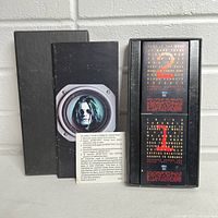 Full view of the Ozzy Osbourne Live & Loud cassette box set with instruction insert for the tattoo application.