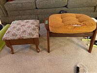 Both footstools side by side on carpet showing size difference and overall appearance