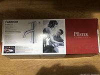 Closed original Pfister Fullerton box showing faucet image and branding.