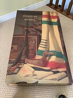 Original decorative Hudson's Bay Blankets storage box showing artwork and printed branding