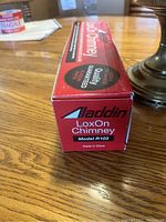 Boxed Aladdin LoxOn Chimney Model R103 on table