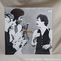 Front cover of Santana "Inner Secrets" vinyl LP album featuring band members in black and white photo.