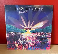 Front of Supertramp Paris 1979 album gatefold cover showing colorful Arc de Triomphe design