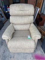 Front view showing full recliner, cushion layout and armrest covers