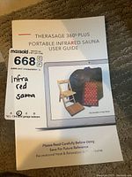 Printed Therasage 360° Plus user guide cover showing sauna, chair and footpad
