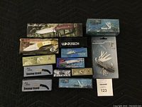 Full view of the assortment of cutting utensils showing various sizes and styles in original packaging.