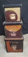 Three nested storage boxes stacked, showing Latte, Cappuccino, and Mocha coffee designs on front panels
