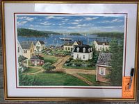 Full view of large framed print with gold and red frame depicting Maine harbor by James Maddox.