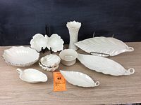Photo showing the full lot of 10 Lenox china pieces including leaf-shaped dishes, candy dishes, sauce boat, vase, all white with some having platinum rims