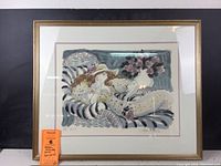 Full view of the signed and numbered print in gold and red frame with matting, image shows overall condition and size.