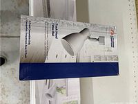 Box showing Lithonia Lighting track head and track rail in white finish.