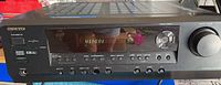Front view of Onkyo TX-SR304 AV receiver showing missing video control knob and display screen on front panel.