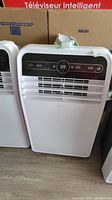 Front view of Insignia portable AC unit showing control panel and vents