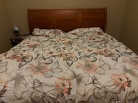 Front view of assembled king size bed with bedding