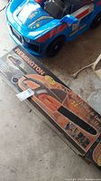 Chainsaw in original Remington box showing product image and branding