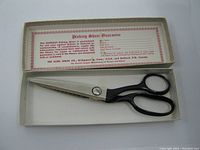 Kleencut pinking shears scissors in original box with guarantee card visible.