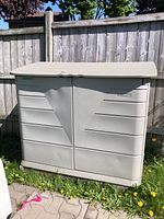 Front exterior view of closed storage box, shows overall condition