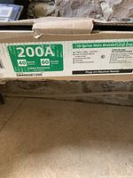 Cardboard box exterior showing Siemens SN Series 200A, 40 spaces, 60 circuits indoor enclosure label, model SN4060B1200