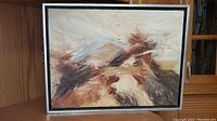 Full view of framed original oil painting on canvas with abstract landscape in earthy tones