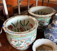 Two planter pots side by side showing overall exterior and interior views