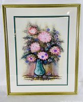 Front view of the framed floral still life painting showing the full bouquet in a blue-green vase.
