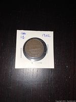 Obverse side of a 1902 Canadian 1 cent coin showing King Edward VII portrait.