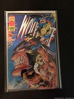 Front cover of X-Men Deluxe Wolverine comic book showing Wolverine with claws attacking a large figure, bright vibrant colors, in protective sleeve.
