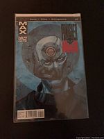 Front cover of Punisher MAX Comic Book Issue #7 showing intense cover artwork with explicit content label.