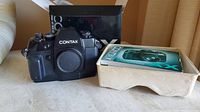 Contax AX camera body with body cap, original box and instruction manual in molded tray