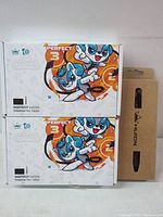 Two Huion Inspiroy H420X Creative Pen Tablets in factory packaging and one Huion digital pen box.