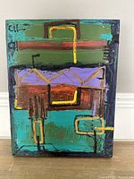 Full view of the abstract oil painting showing colorful geometric shapes and lines on canvas.