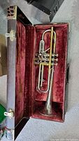 OLDS Studio Fullerton trumpet in its original case with red velvet lining.