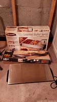 Bravetti Gourmet Buffet Server in box, Salton Hot Tray in box, and Salton Hot Tray stainless steel surface with power cord