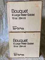 Two original boxes labeled Bouquet 6 Large Water Goblet 10 oz 284 ml by Hudson's Bay Company.