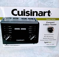 Front view of the toaster on the box showing dual control panels, 7 shade settings, and key functions like bagel, defrost, reheat, and cancel with blue LED indicators.