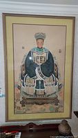 Full frontal view of large framed print depicting Empress seated on carved chair